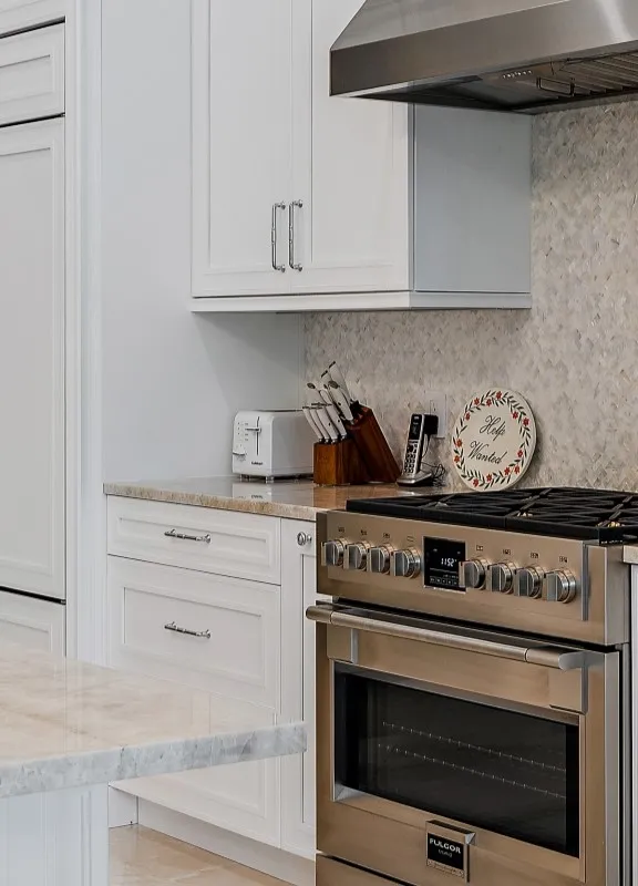 Transitional Kitchen Cabinetry Remodel with  white cabinet doors, floating island and quartz counter tops